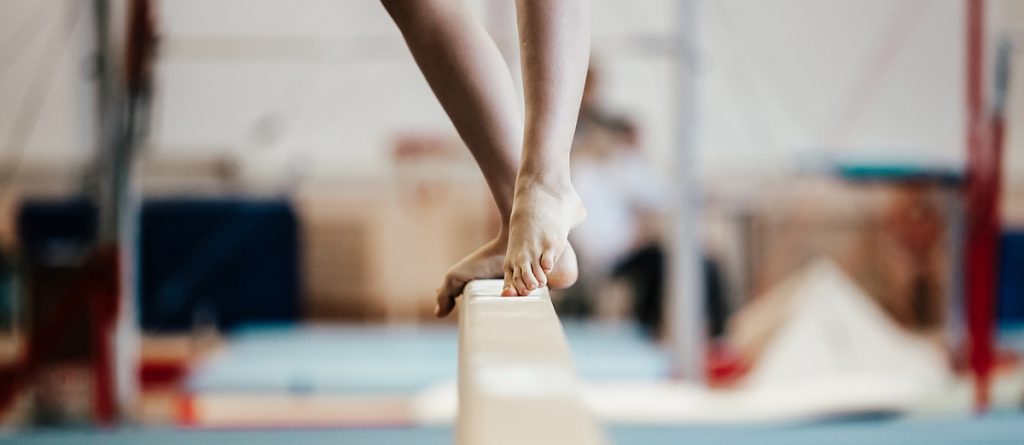 a gymnast balancing